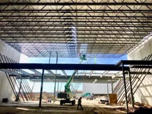 Alpine Roofing Construction building a metal roof for Grandscape in the Colony