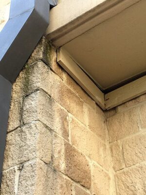 The underside of a wooden roof damaged by water