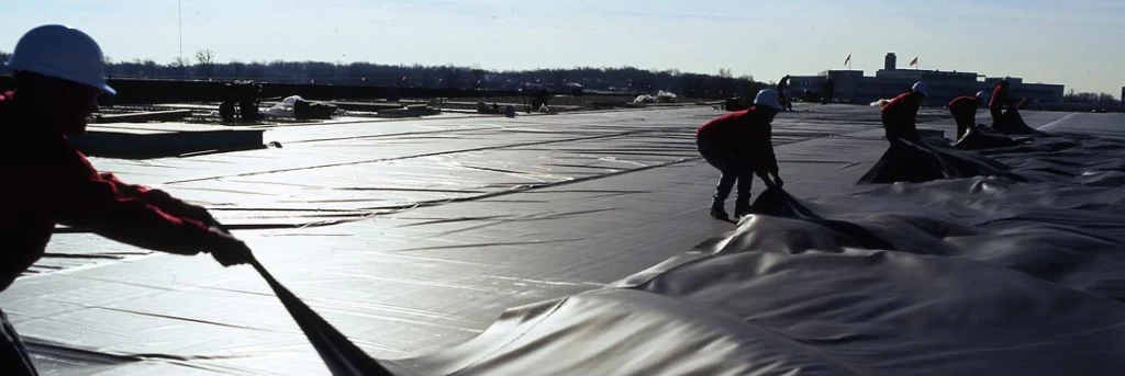 Alpine Roofing Construction installing an EPDM Roof