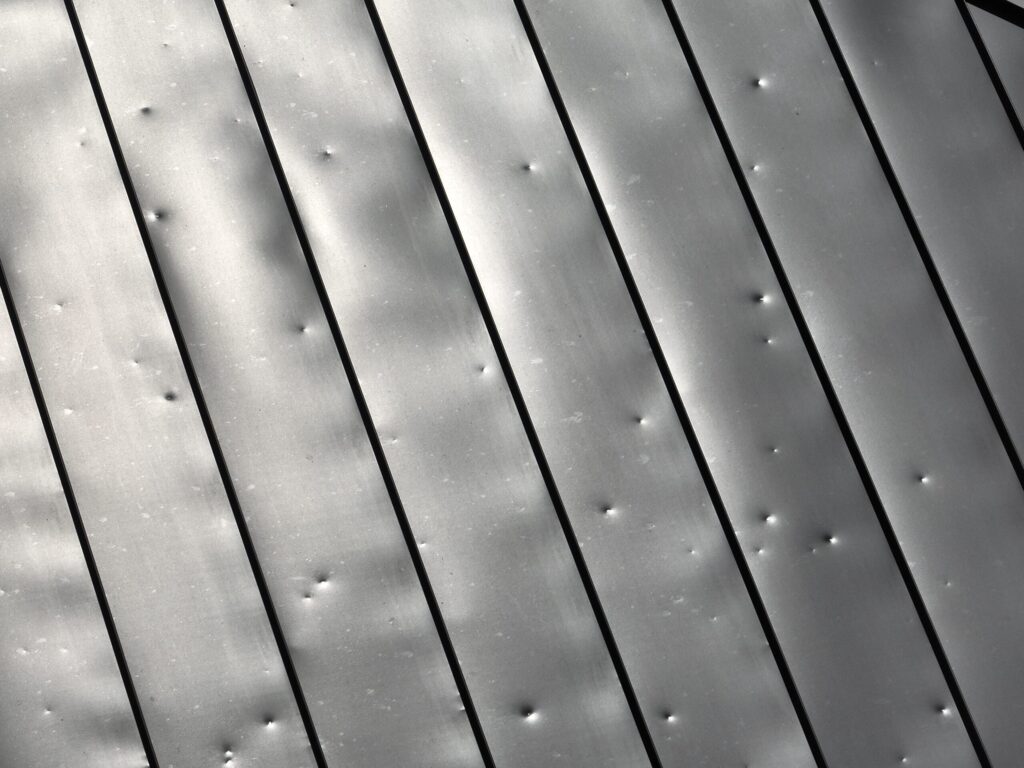 Hail Damage on Metal Roofing System